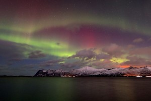 Beautiful Northern Lights over Svolvær - Lofoten Islands, Norway