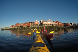 Guided kayak trip in Lofoten, on the way out of the fjord - Reine , Lofoten Islands, Norway