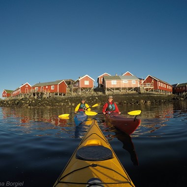 Guided kayak trip in Lofoten, on the way out of the fjord - Reine , Lofoten Islands, Norway