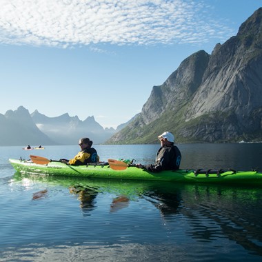 Things to do in Reine - Guided kayak trip on the Reinefjord on a sunny day, Lofoten, Norway