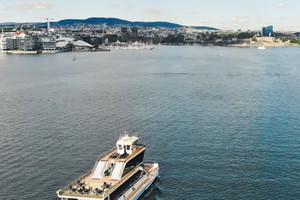 Oslofjord cruise with a silent hybrid boat - view towards Oslo, Norway