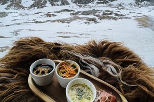 At the top of Mount Ulriken - platter with local food - Activities in Bergen, Norway
