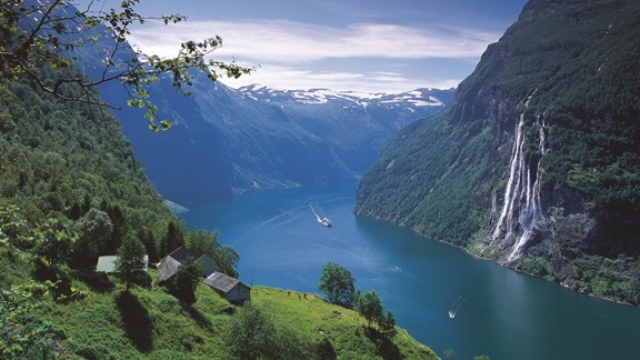 View of the famous Geirangerfjord & Norway in a nutshell®. The tour takes you to the Geirangerfjord, the Nærøyfjord and the Bryggen Wharf houses in Bergen. The Geirangerfjord is one of the famous Norwegian fjords