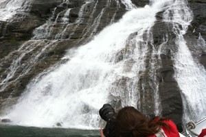 Photo stop by the waterfall in the Geirangerfjord - RIB boat trip on the Geirangerfjord, Norwegen